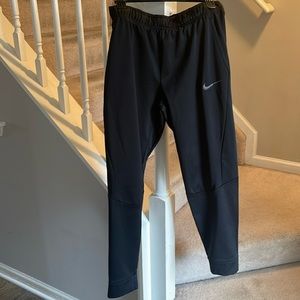 Nike Men’s NWOT black joggers.